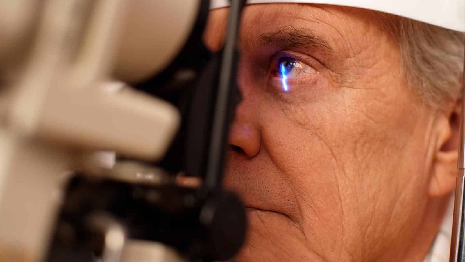 A man having an exam to see what are the first signs of glaucoma